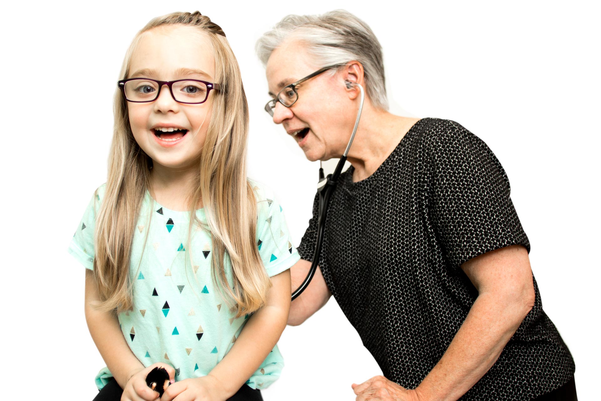 A little girl with a female doctor